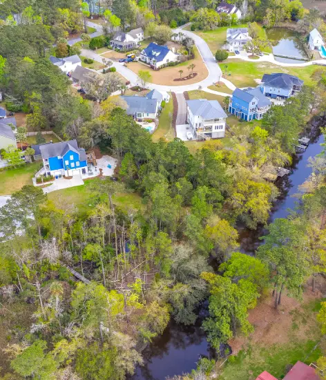 A view of houses and trees from above.