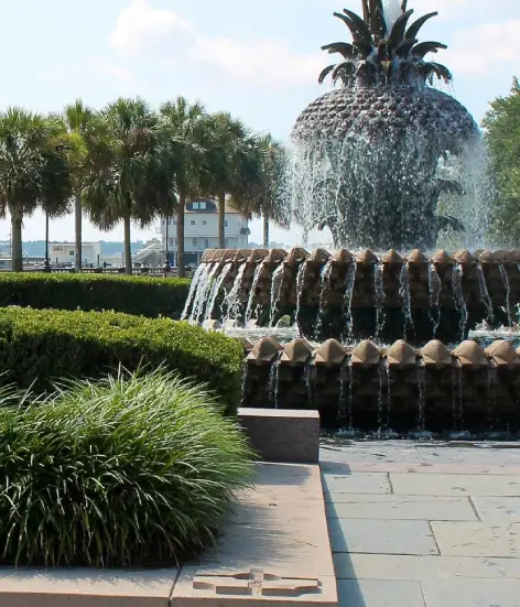 A fountain with water pouring out of it.